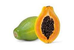 Papaye orange coupée en deux, fruit tropical en P