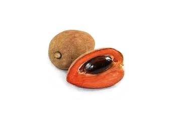 Sapote coupée en deux, montrant la chair et les graines noires