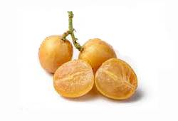 Grappe de wampis jaune-brunâtres, fruit asiatique en W